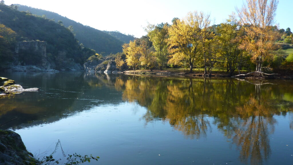 View of the Eyrieux river in autumn.